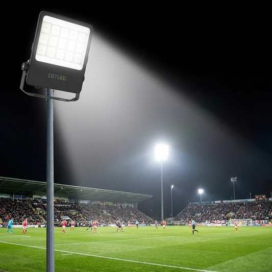 LED flood light illuminating a stadium field at night